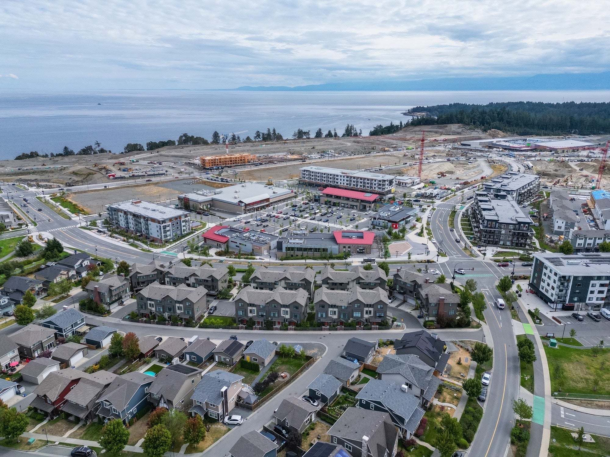 Aerial view of the Royal Bay neighbourhood, Commons and coastline