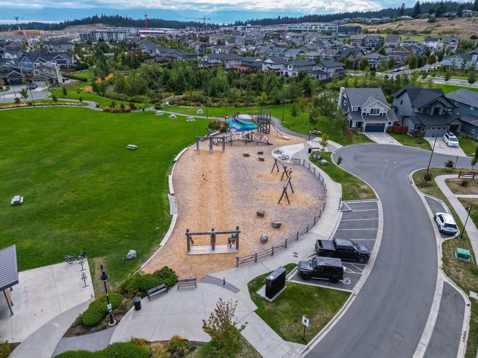 Aerial view of a playground and green space in Royal Bay