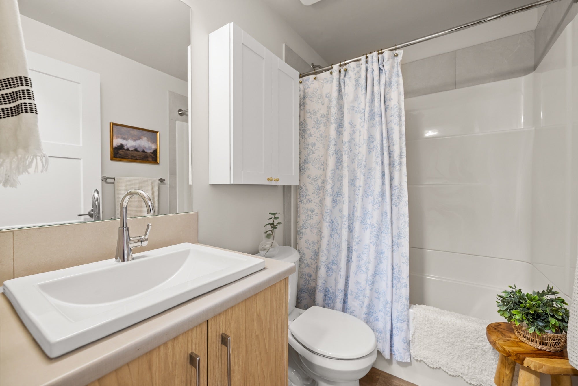 Bathroom with vanity, tub and shower