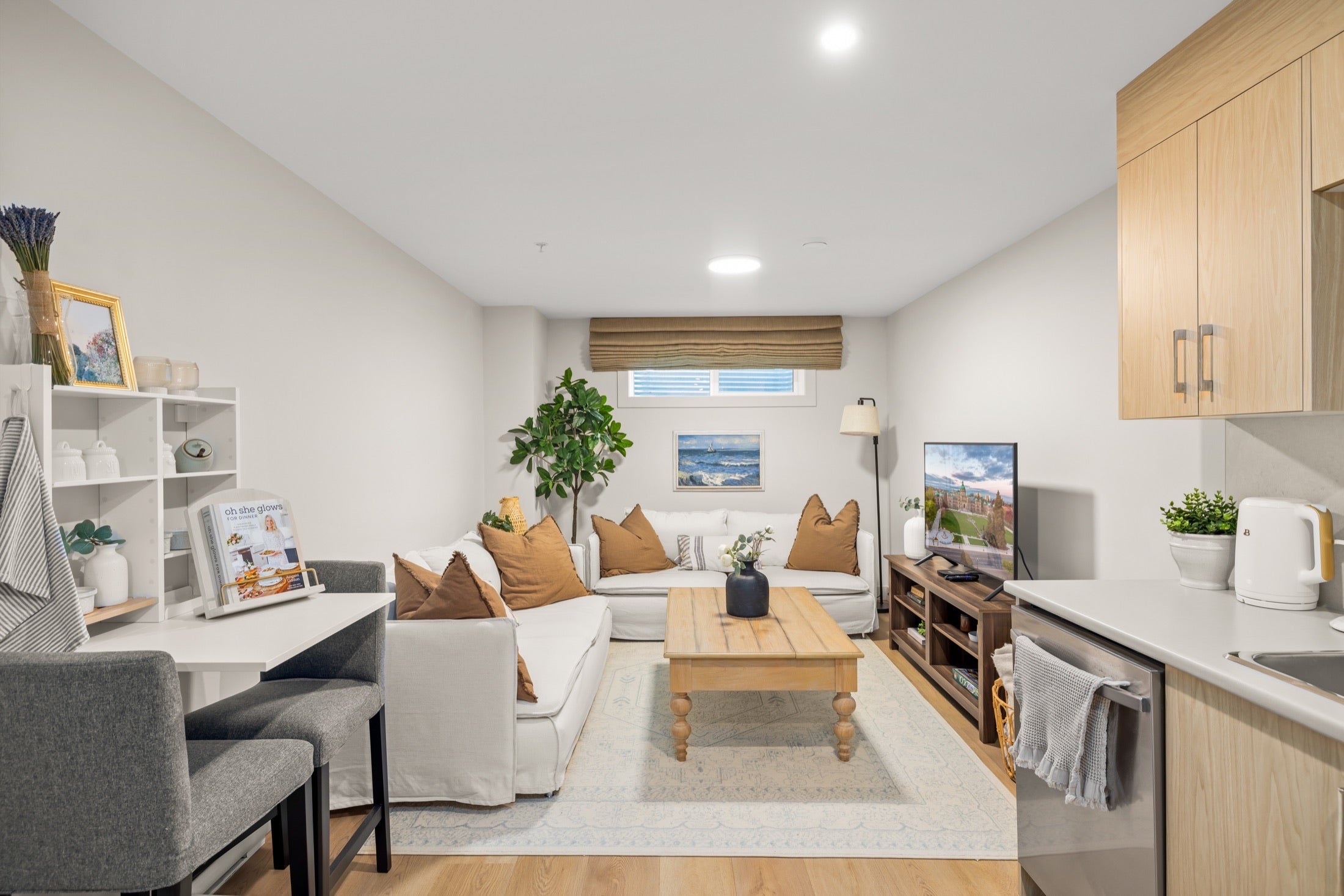 Open living room beside the kitchen and dining table